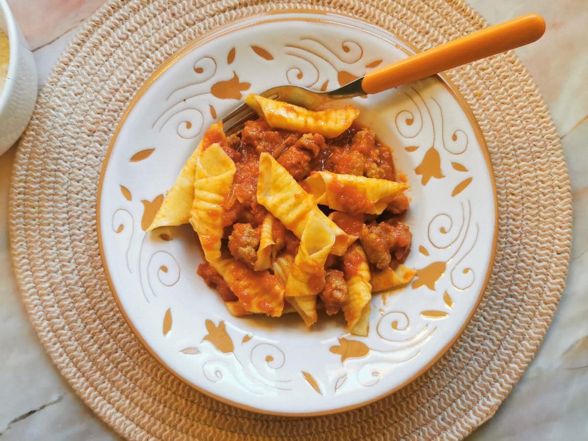 Homemade garganelli pasta with sasuage ragu.