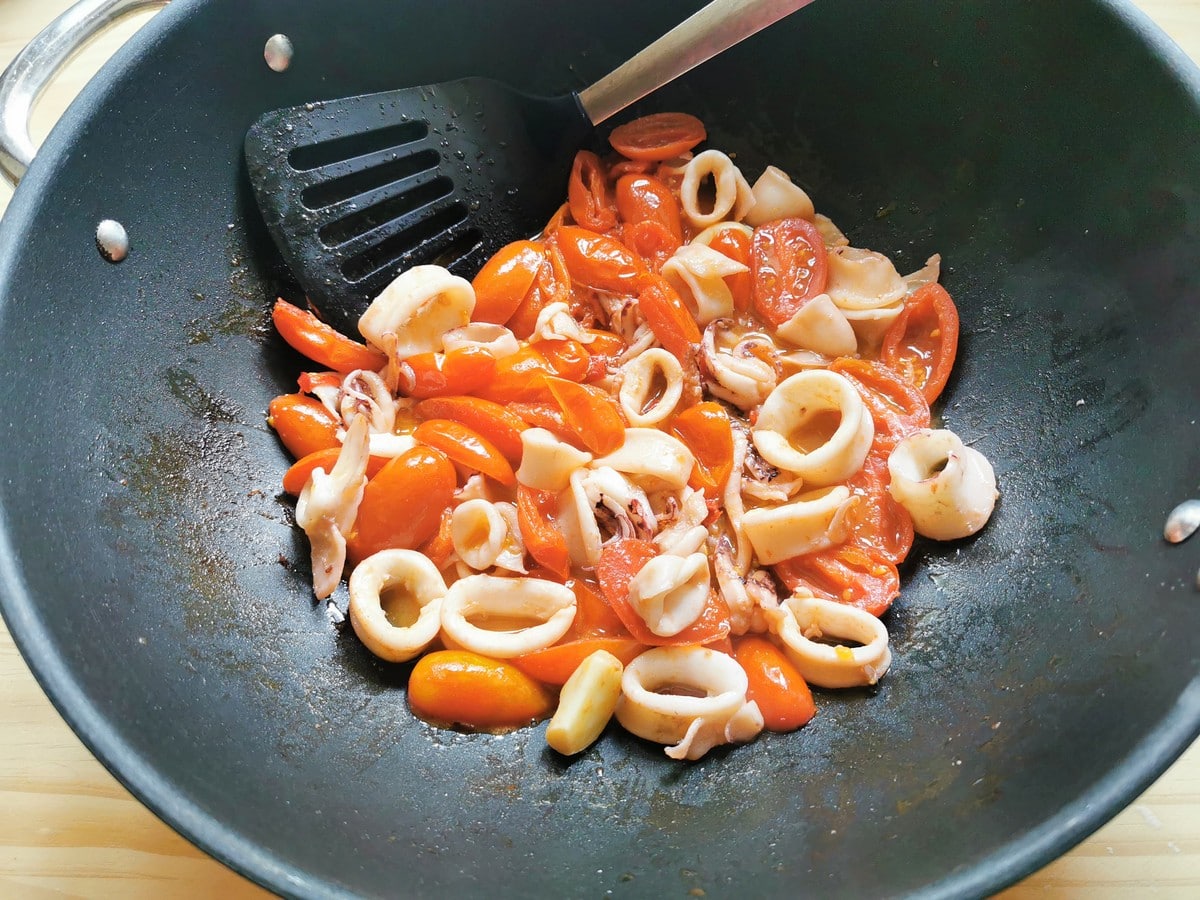 La Calamarata sauce simmering in a pan.