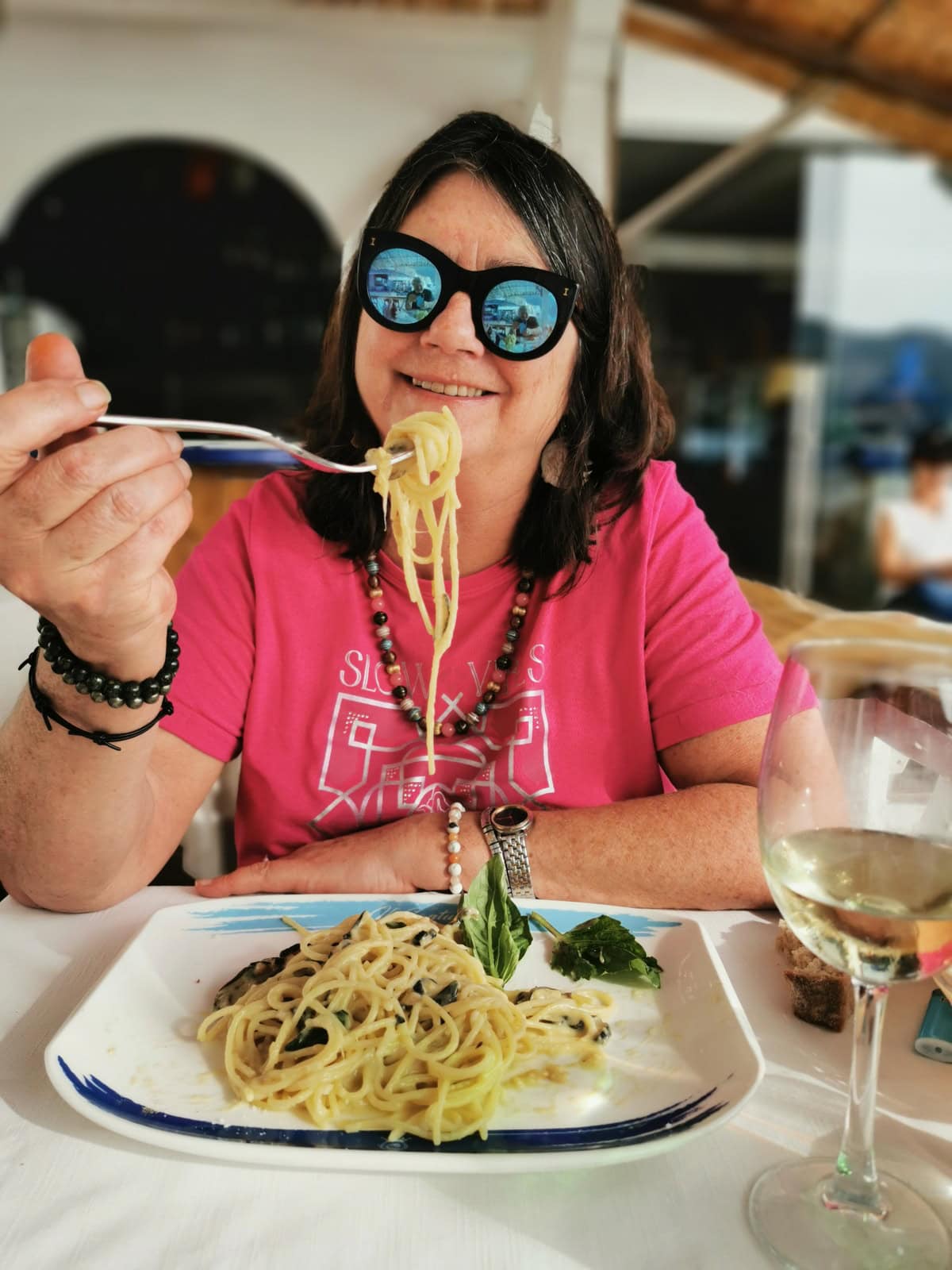 The author enjoying spaghetti alla Nerano in Nerano, Italy.