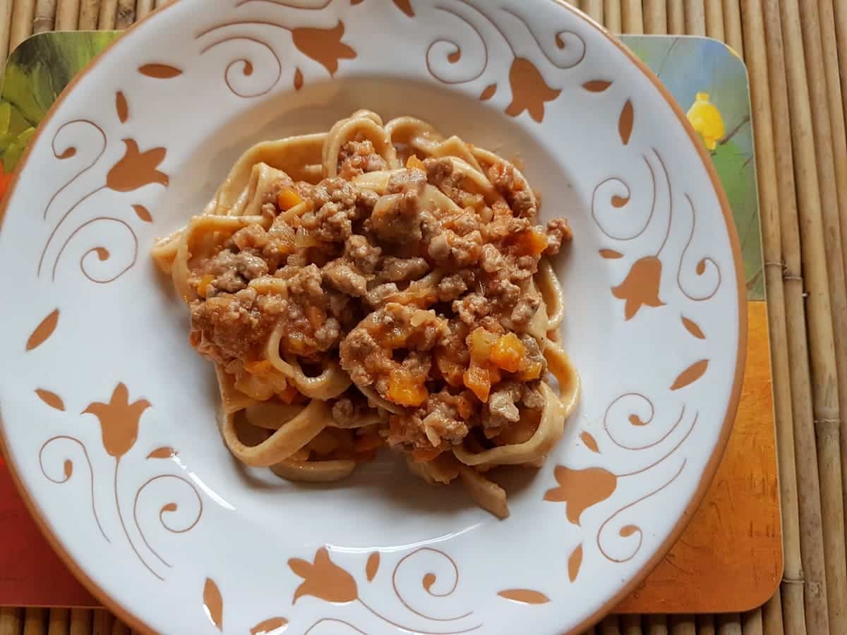 Tagliatelle Bolognese in a bowl.