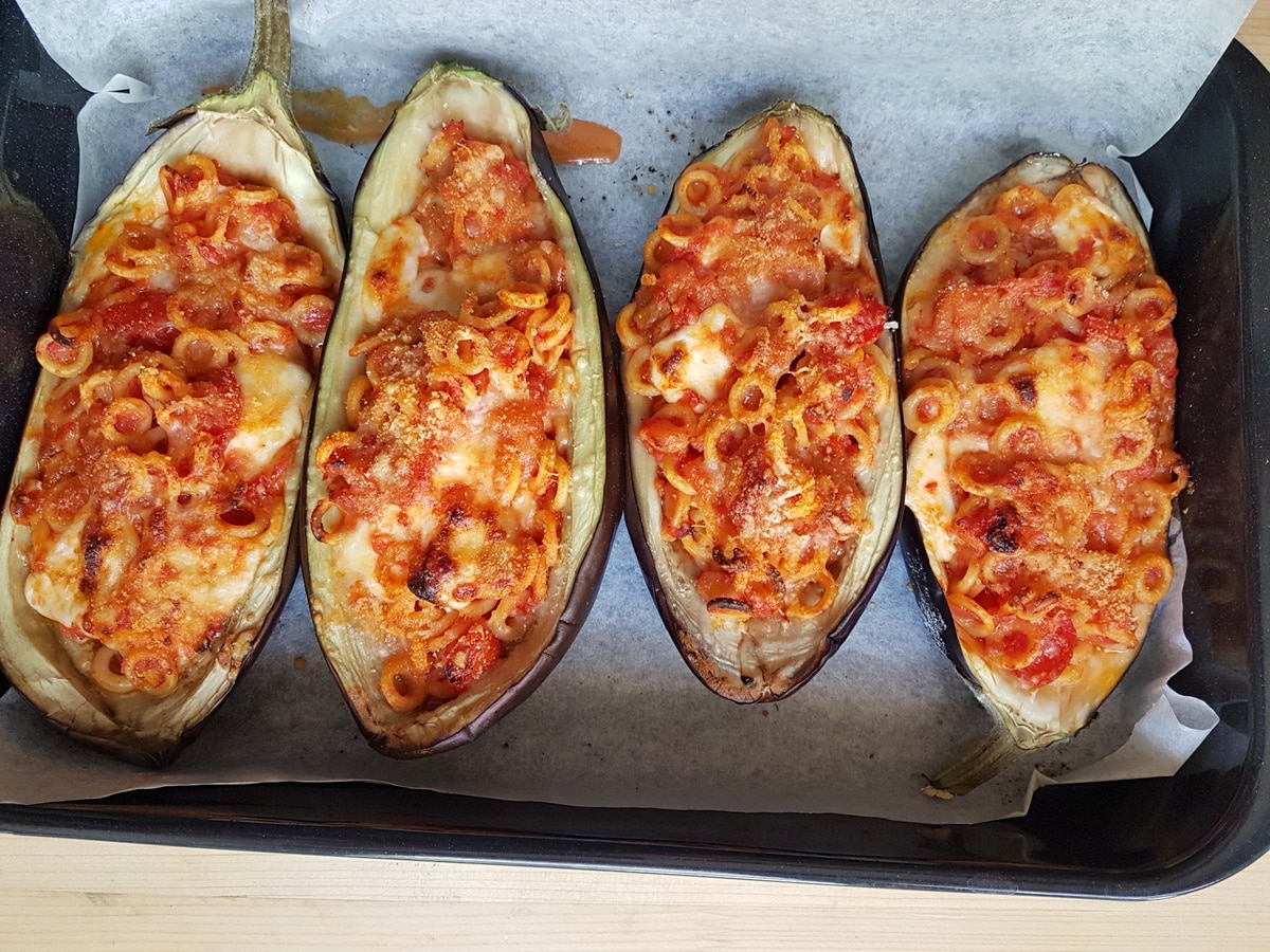 Baked eggplant boats with a crunchy breadcrumb topping.