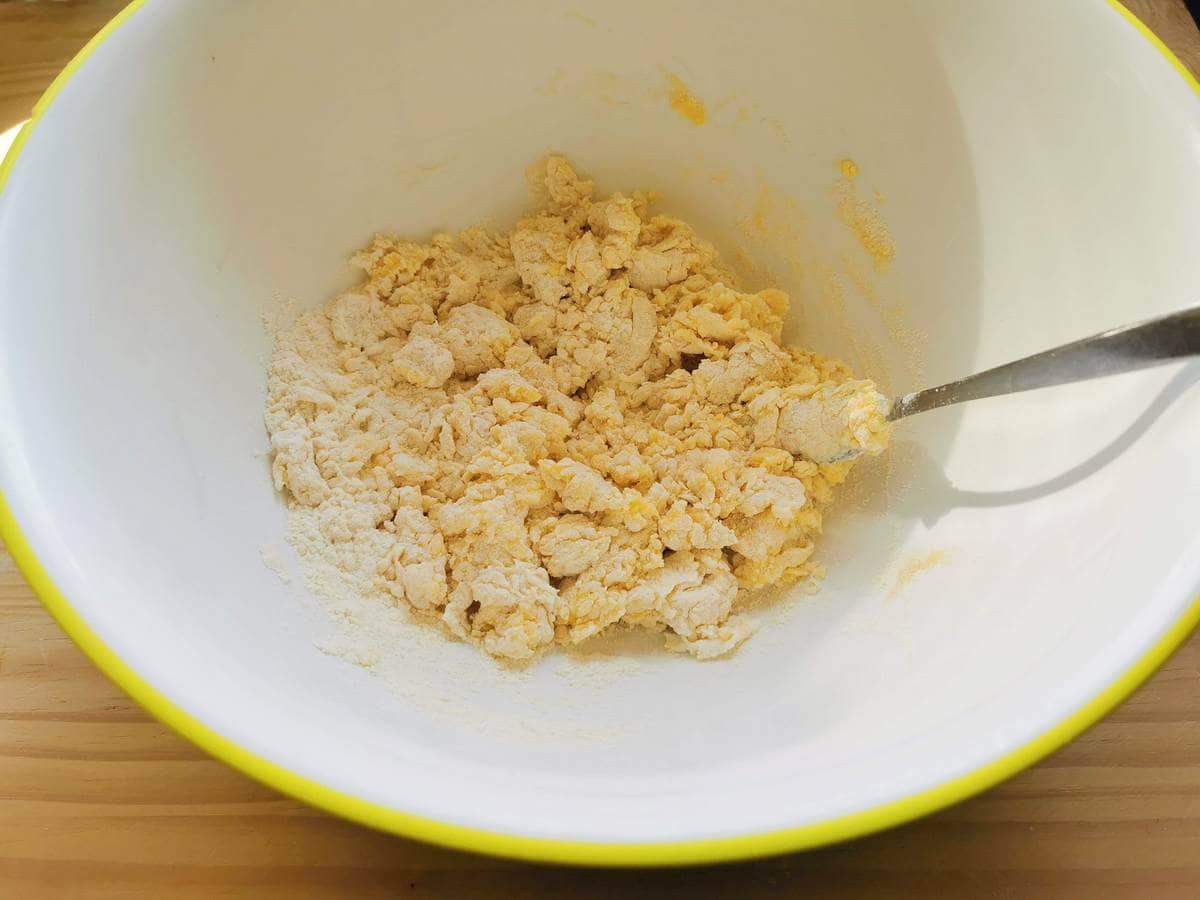 Flour and eggs mixed together in large bowl.